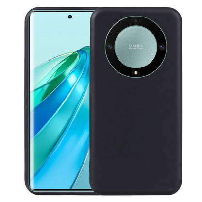 Black TPU phone case with circular camera cutout for a smartphone