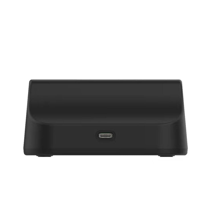 Black desktop charging dock with centered USB-C port on the front side