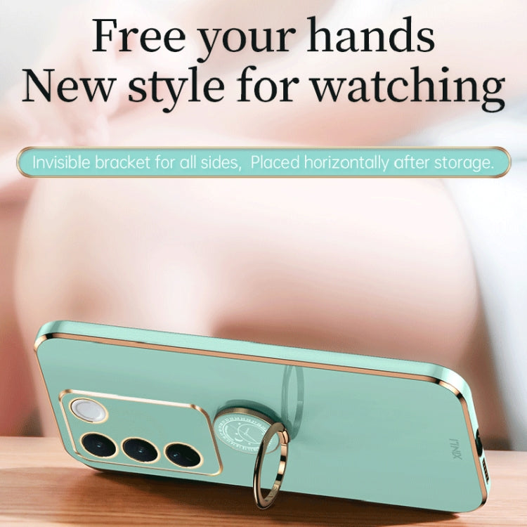 Teal phone case with gold electroplate border and ring holder loop on back