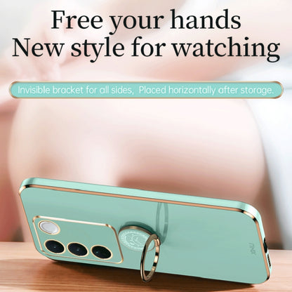 Teal phone case with gold electroplate border and ring holder loop on back