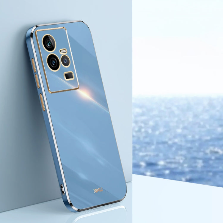 Light blue TPU phone case with gold electroplated trim and triple camera cutouts.