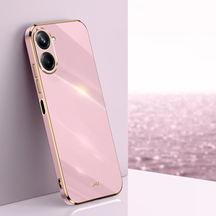 Rose pink TPU phone case with gold electroplated trim and dual camera cutouts.