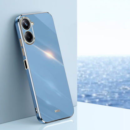 Sky blue TPU phone case with gold electroplated trim and dual camera cutouts.