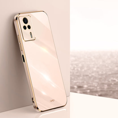 White electroplated TPU phone case with gold trim and camera cutouts