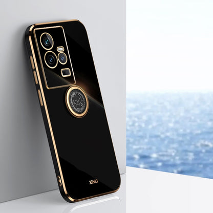 Black TPU phone case with gold electroplate edges and ring holder near camera