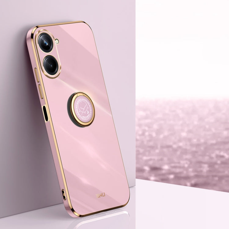 Rose pink TPU phone case with gold electroplate edges and ring holder near camera