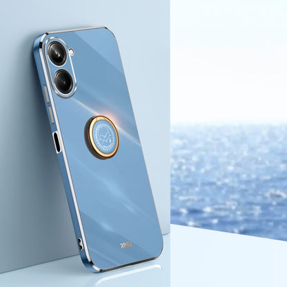 Light blue TPU phone case with silver-toned electroplate edges and ring holder near camera