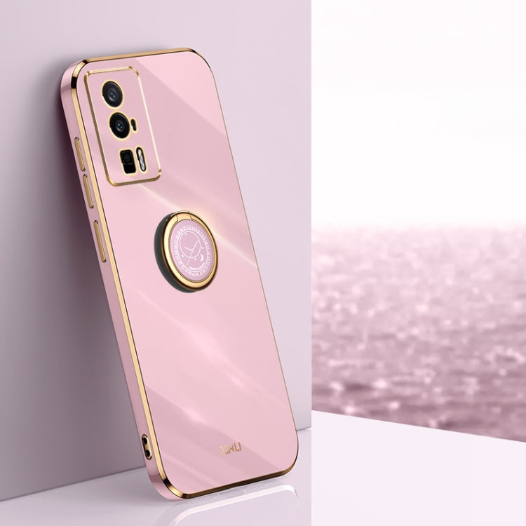 Light pink TPU phone case with gold trim, electroplate style, and ring holder