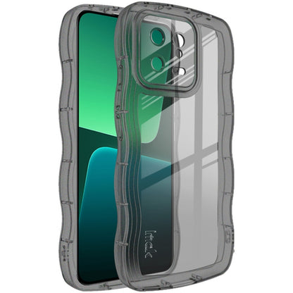 Transparent shockproof TPU phone case with dark bumper, raised camera lip