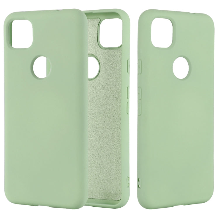 Green silicone phone case with full coverage and cutouts for camera and ports