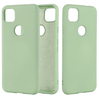 Green silicone phone case with full coverage and cutouts for camera and ports
