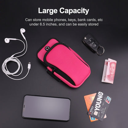 Pink sports arm bag with zipper pocket and headphone cable opening