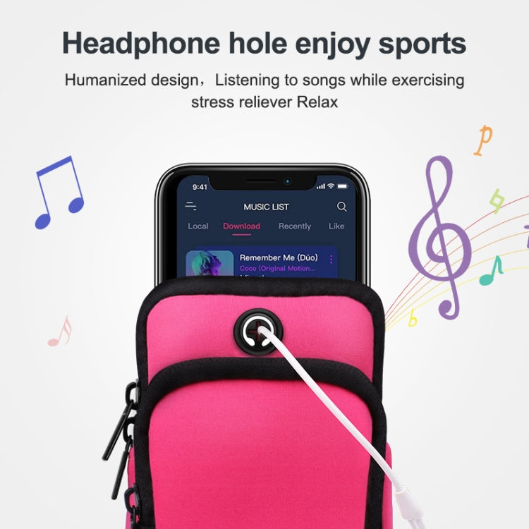 Pink sports arm bag with headphone cable through front hole