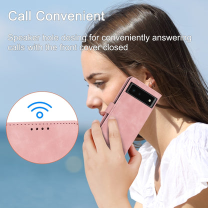 Pink flip phone case with speaker port, worn like a phone wallet