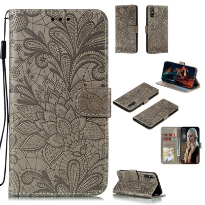 Embossed floral leather phone case with flip cover and lanyard strap, beige/gray