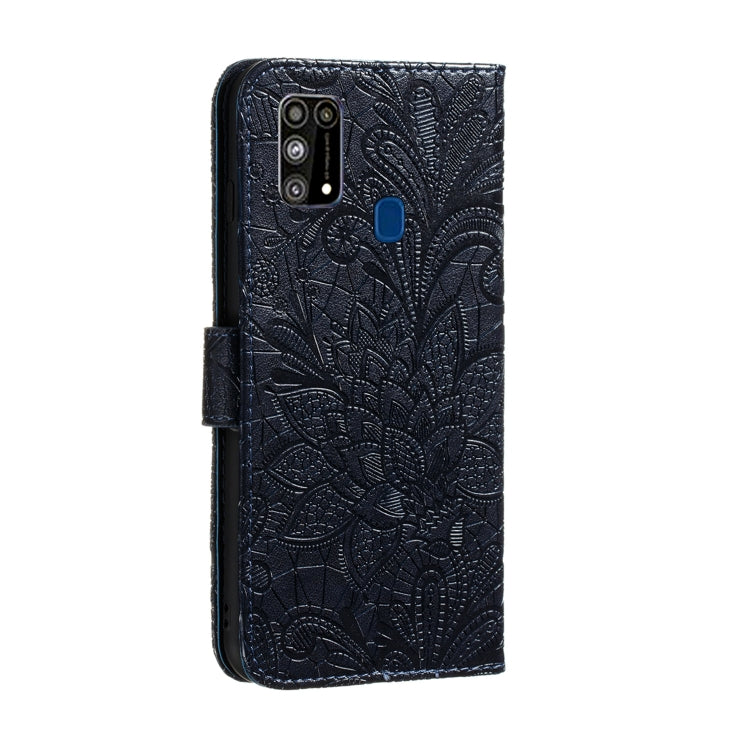 Dark blue embossed floral leather wallet case with cutouts and phone back coverage