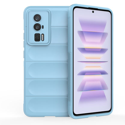 Light blue TPU flannel phone case with camera cutouts and raised edge for screen protection