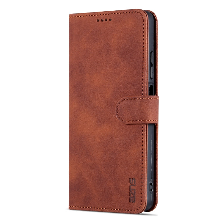 Brown leather flip phone case with side openings and interior card pocket