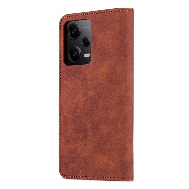 Brown leather flip phone case with cutout for triple camera module