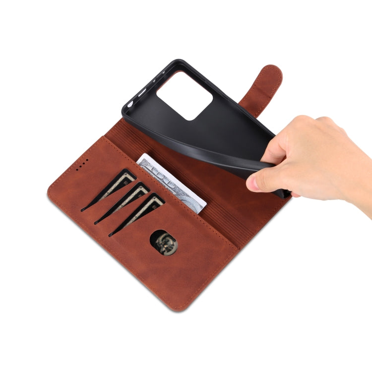 Brown leather flip phone case with card slots and hand placing phone