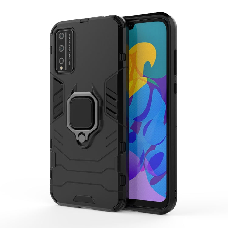 Black rugged phone case with magnetic ring holder and raised camera protection.