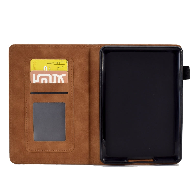 Brown leather smart case with front pocket slots and visible tablet inside