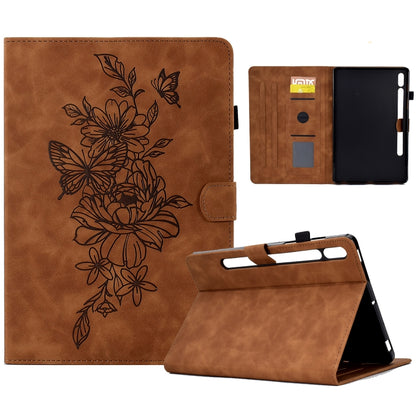 Brown leather tablet case with embossed floral butterfly design and fold stand