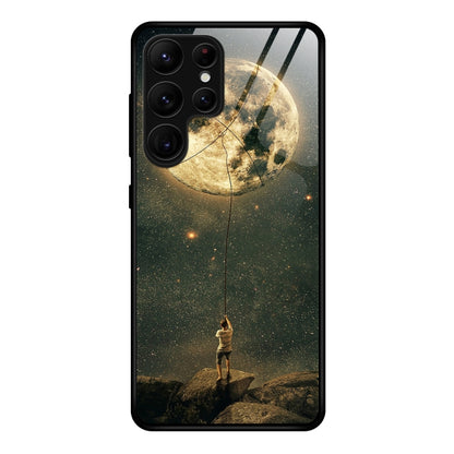 Glass phone case with moon and starry astronaut scene in dark tones