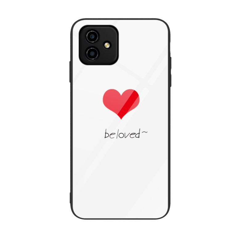 Glass phone case with small red heart icon on white background