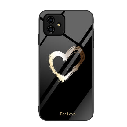Glass phone case with gold heart graphic on dark background, camera cutouts
