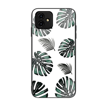 Painted glass phone case with black and green tropical leaf pattern