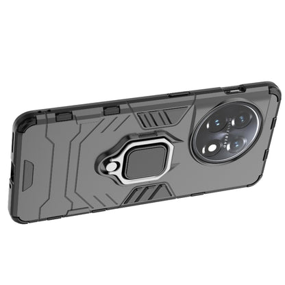 Gray rugged phone case with magnetic ring holder, top side close-up