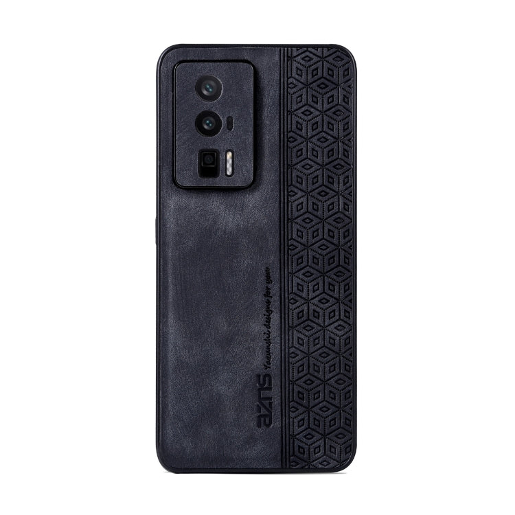 Black phone case with textured geometric border, camera cutout, and tactile panel