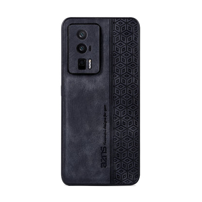 Black phone case with textured geometric border, camera cutout, and tactile panel
