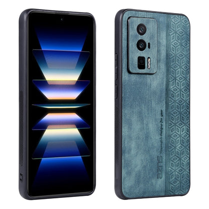 Dark green phone case with embossed geometric panel and raised camera cutout