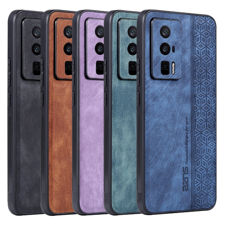 Set of embossed phone cases in black, brown, purple, and blue with camera cutouts