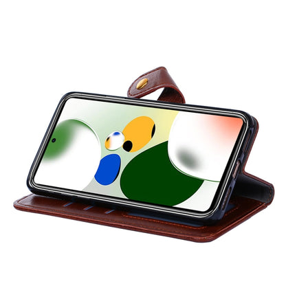 Brown leather wallet-style phone case with flip cover and side strap loop
