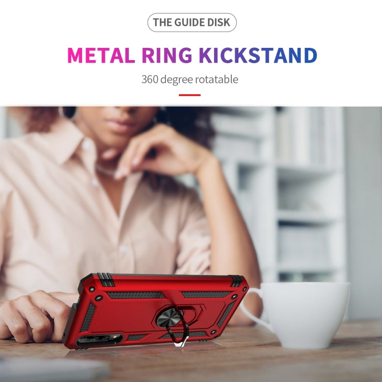 Red protective phone case with metal ring kickstand, ready for tabletop viewing