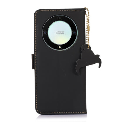 Black leather phone wallet case with camera cutout and decorative chain charm