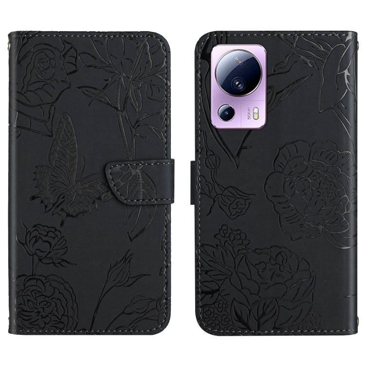 Black butterfly-embossed leather flip phone case with front flap and camera cutout
