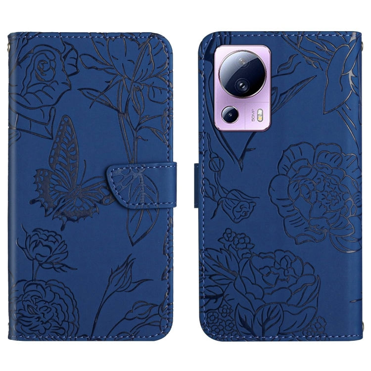 Blue butterfly-embossed leather flip phone case with front flap and camera cutout