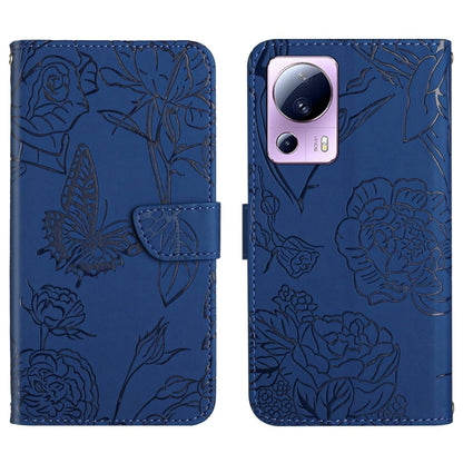 Blue butterfly-embossed leather flip phone case with front flap and camera cutout
