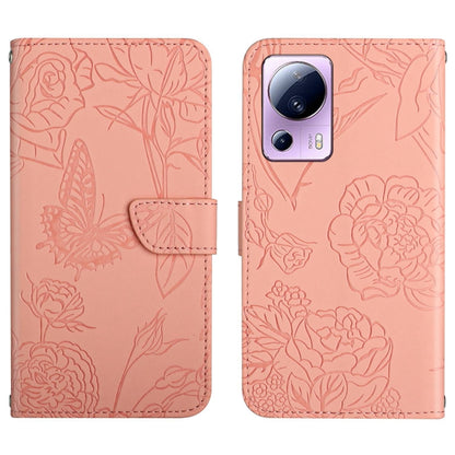Pink butterfly-embossed leather flip phone case with front flap and camera cutout