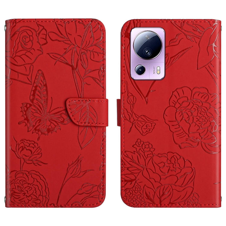 Red butterfly-embossed leather flip phone case with front flap and camera cutout