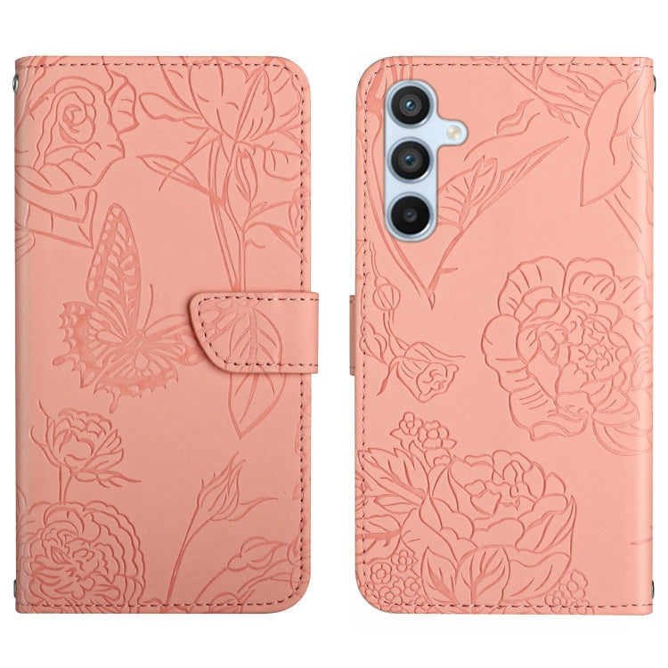 Pink butterfly-embossed leather flip phone case with front flap and triple camera cutout