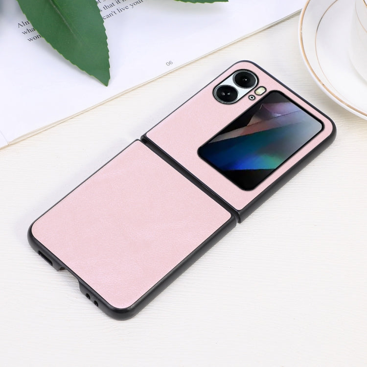 Pink faux cowhide texture flip phone case for OPPO Find N2 Flip, shown partially open.