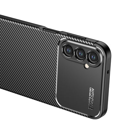 Carbon fiber TPU phone case corner view with triple camera area and side port cutouts