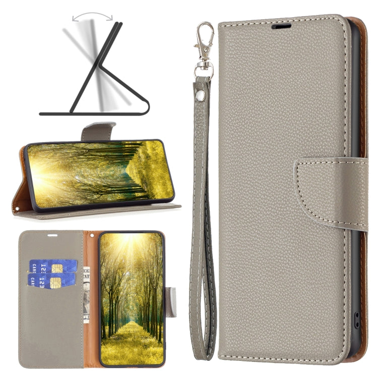 Grey textured leather phone case with folio flap and wrist strap