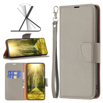 Grey textured leather phone case with folio flap and wrist strap