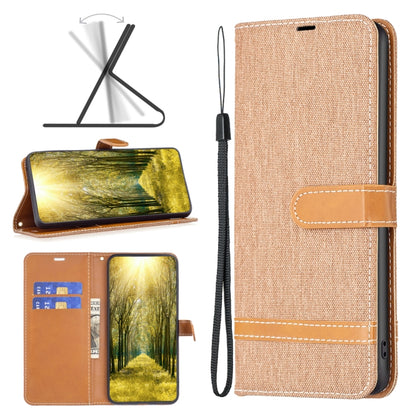 Tan fabric-texture leather-style phone case with folio stand and wrist strap